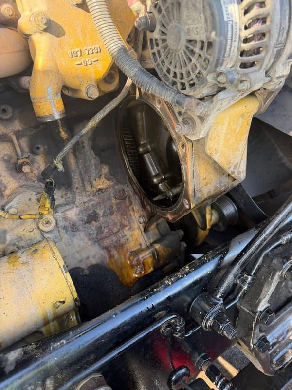 Alternator on a Caterpillar engine during an on site replacement